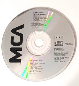 On Solid Ground ~ Larry Carlton ~ Jazz - Blues ~ CD ~ Used  Music CD Disc Only - Bild 1 von 1