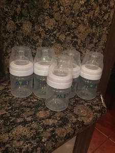 JUEGO DE 5 BOTELLAS CLÁSICAS DE AVENT 4 oz, reduce los cólicos y LIBRE DE BPA. ¡BAJO PRECIO! - Imagen 1 de 2