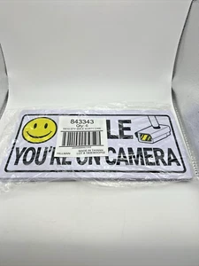 Letrero de seguridad de plástico Hillman de 5" x 10" SMILE YOU'RE ON CAMERA 843343 cantidad 6 - Imagen 1 de 4