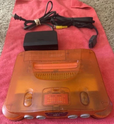 Consola Nintendo 64 N64 Funtastic Fire Orange con cables OEM y paquete de expansión Foto 1 de 4