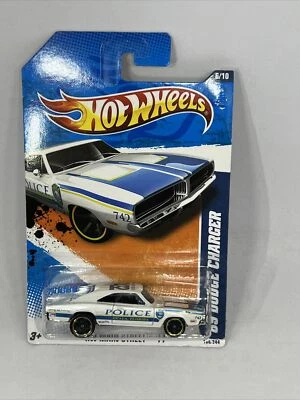 HOT WHEELS 2011 HW MAIN STREET '69 DODGE CHARGER POLICE Florida Ocala Red Line  - Image 1 of 4