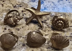 6 Anelli Tovagliolo Ottone Conchiglie Stella Marina Conchiglia Decorazione Marina Costa Nautica - Foto 1 di 8