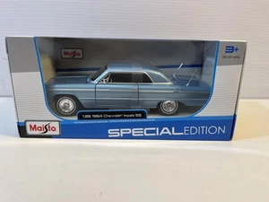 1964 Chevy Impala New In The Box in 1/26 Scale Diecast by Maisto - Picture 1 of 7
