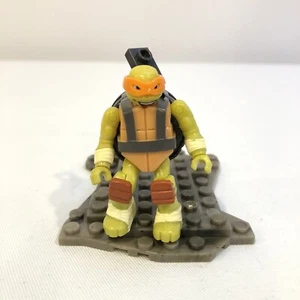 MEGA BLOKS TMNT MIKEY FIGURE & ZIPLINE BACKPACK FROM PIZZERIA SHOWDOWN SET DMX51 - Picture 1 of 5