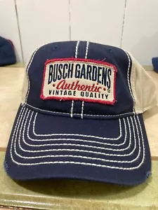 BUSCH GARDENS AUTHENTIC QUALITY NAVY & BEIGE MULTI-COLORED EMBROIDER ADJ HAT/CAP - Picture 1 of 2