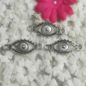 Envío Gratis 70 Piezas Conectores Ojos Plateados Antiguos 30X13MM H-1416 - Imagen 1 de 4