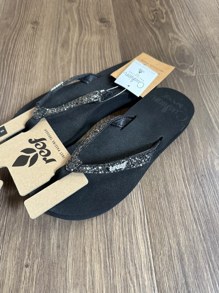 Sandalias chanclas Reef Star Cushion atrevidas para mujer negras brillantes talla 5  Foto 1 de 4