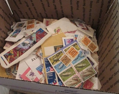 4 pounds of US postage stamps Box lot hoard on paper box filled to the top..232 - Image 1 of 4