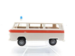 313HO /12 - Brekina 1/87 3310 - VW T2 Bus Polizia Schweiz weiß/rot - top - Bild 1 von 3