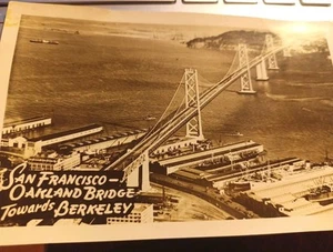 Rppc San Francisco Oakland Bridge towards Berkeley ships barges postcard a107 - Picture 1 of 2