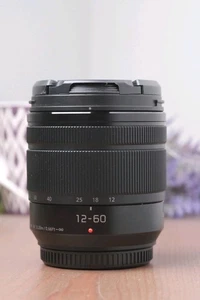 Panasonic Lumix G Vario 12-60 mm F3,5-5,6 Power O.I.S. Lente MFT con tapas - Imagen 1 de 6