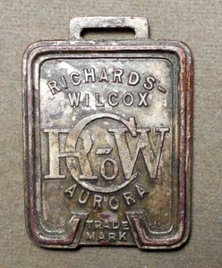 Fob: Aurora, Ill., U.S.A., Richards-Wilcox, Doorways (Logo), Door Hangers, Grind - Picture 1 of 2