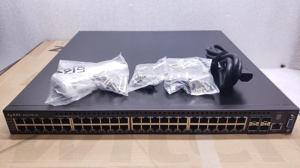 ZyXEL (XGS3700-48) 10GbE SFP+ 52P Network Switch w/ 48-Port Static Routing #99 - Image 1 of 4