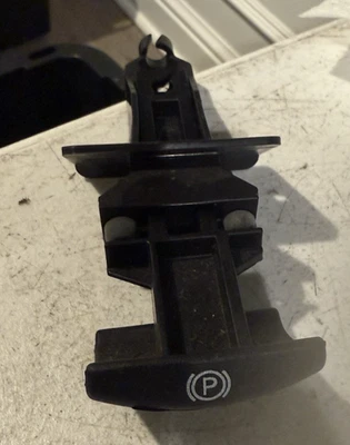 Cadillac CTS 2007 palanca de liberación de freno de estacionamiento de emergencia usada OEM Foto 1 de 4