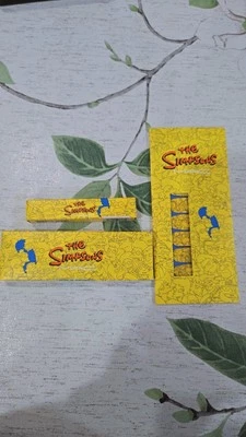 Mac x The Simpsons  Lip Gloss, Nail Stickers,Quad Eyeshadow Limited Edition  - Image 1 of 4
