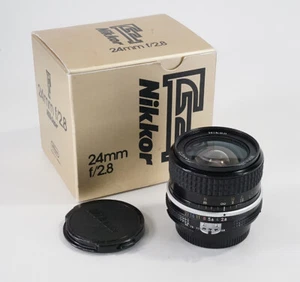 24MM 24/2.8 NIKKOR AI (POLVO, ARAÑAZOS LIGEROS) + CAJA (# COINCIDENCIAS)/220466 - Imagen 1 de 2