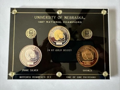 Juego de monedas 1997 Nebraska Cornhuskers Champs oro 24kt SelectSilver bronce 196/1000 Foto 1 de 4