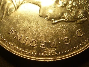 Error - Canada 1983 BU nickel dollar, struck through oil/water, 10% of obverse - Picture 1 of 4