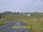 Photo 6x4 Fell road with farm in background. Whitrigg Bird House Farm is  c2005