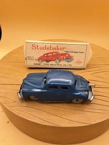 Coche de cuerda de juguete Studebaker vintage con caja original Sinsei ocupado Japón skk - Imagen 1 de 6
