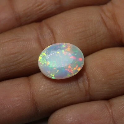 3.9 Cts 13.3x10.6 MM Natural AAA Red Green Yellow Fire Ethiopian Opal Oval Cut - Image 1 of 4