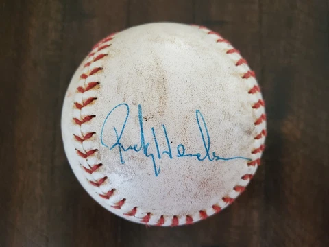 Rickey Henderson Autographed Softball Cover