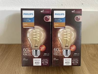 Philips Dimmable Vintage 60W Amber A19 LED Decorative Light Bulb, NEW 2 PACK - Image 1 of 4
