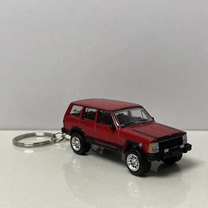 RARE KEY CHAIN RED JEEP CHEROKEE XJ CUSTOM LIMITED EDITION 1984 1985 1986-1996 - Picture 1 of 2