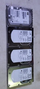Lot of 4 Ultra-320 SCSI 3.5" Hard Drives - Picture 1 of 3