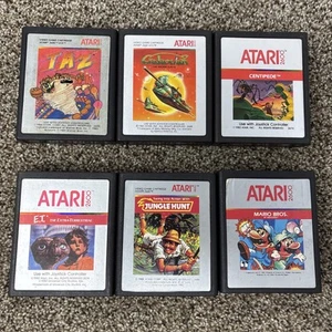 Lote de juegos Atari 2600 etiqueta plata ET Mario Bros Taz Galaxian Centipede Jungle - Imagen 1 de 9