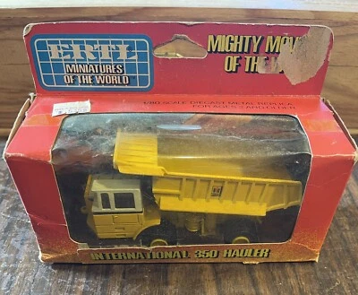 VINTAGE 1/80 ERTL INTERNATIONAL IH 350 HAULER DUMP MIGHT MOVERS OF THE WORLD - Image 1 of 4