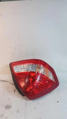 Conjunto de luz trasera izquierda Nissan Versa 2011 negro 153000 millas usado pieza OEM Foto 1 de 4