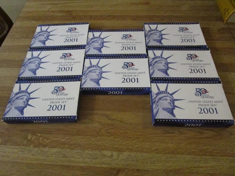 Lot of 8 2001 Proof Sets Cover
