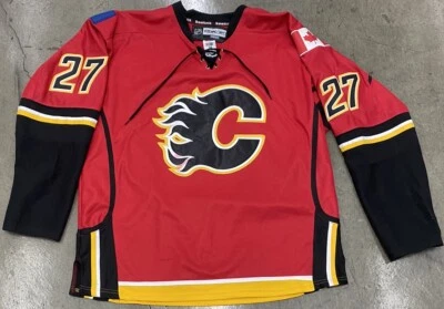 DOUGIE HAMILTON Reebok CALGARY FLAMES #27 CCM Authentic Jersey Sz 58 Fight Strap - Image 1 of 4