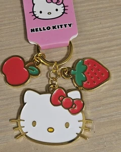 SANRIO HELLO KITTY WITH FRUITS STRAWBERRY CHERRY GOLD TONE KEYCHAIN - Picture 1 of 5
