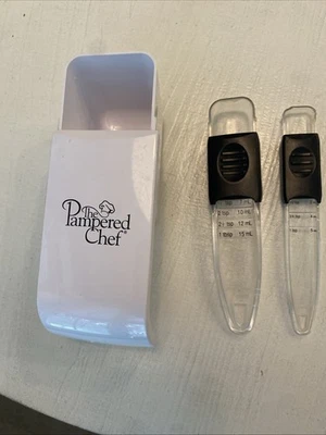The Pampered Chef Adjustable Measuring Cups & Spoons Set Of 3 - Image 1 of 4