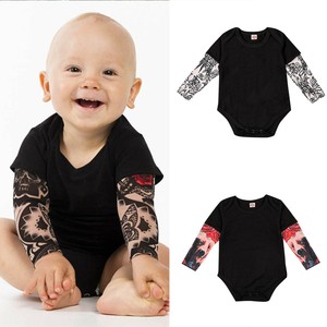 baby onesie with tattoos