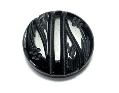 VINTAGE CARVED BAKELITE COAT BUTTON 1-5/8" BLACK FLORAL DESIGN - Image 1 of 2