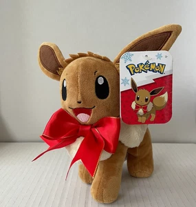 Pokemon Eevee Plüschtier 7 Zoll Christmas Holidays mit rotem Schleifenband Jazwares Neu mit Etikett - Bild 1 von 15