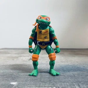 Teenage Mutant Ninja Turtles: Mutant Mayhem Battle Pack: Mikey Figure Loose - Picture 1 of 7