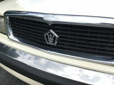 Nuevo de Lote Antiguo MoPar 1989-1991 Chrysler TC Maserati MARCO PARRILLA CROMADO MLDG 4463079 Foto 1 de 2