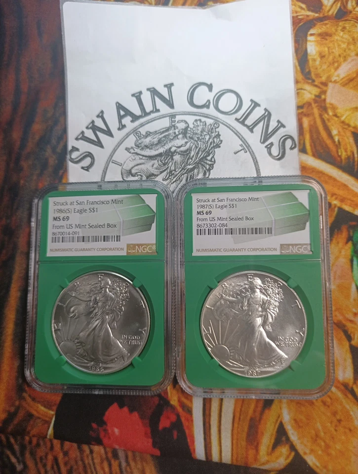 1986 S & 1987 S Silver Eagle NGC MS69 (Green Core)  ER110-113 - Image 1 of 4