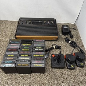 Atari 2600 System Bundle with Console, 30 Games, Joystick, Paddles, and More LOT