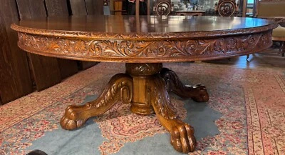 Antique Oak Large 70" Round Claw Foot Dining Table with 7 original leaves - Image 1 of 4