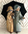 Lladro 2077 "Under the Rain" boy & girl with large umbrella GRES- MWOB, RV$390