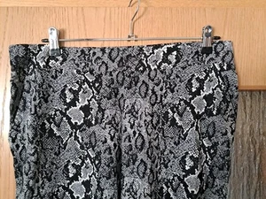Damen Schlangenhose Gr. 42 Mit 2 seitlichen Eingrifftaschen - Bild 1 von 8