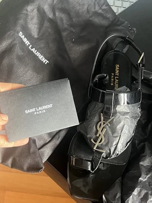 Sandalias Yves Saint Laurent con logotipo 'Cassandra' con tiras en negro talla 38/7,5 Foto 1 de 4