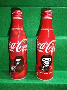 Coca cola APE Japan Giappone 2 bottiglie alluminio nuove - Foto 1 di 1