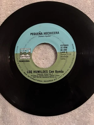 Los Humildes 45 VINYL RECORD VG+ Pequeña Hechicera Y Mi Corazón se suicidal Con - Image 1 of 2