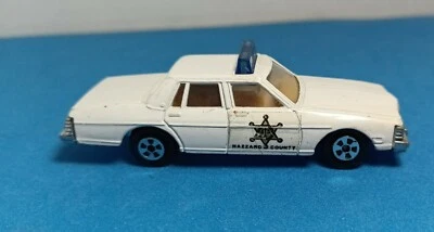 Pontiac Bonneville 1980 réplica Ertl - Hazard County Sheriff - blanco con azul Foto 1 de 4